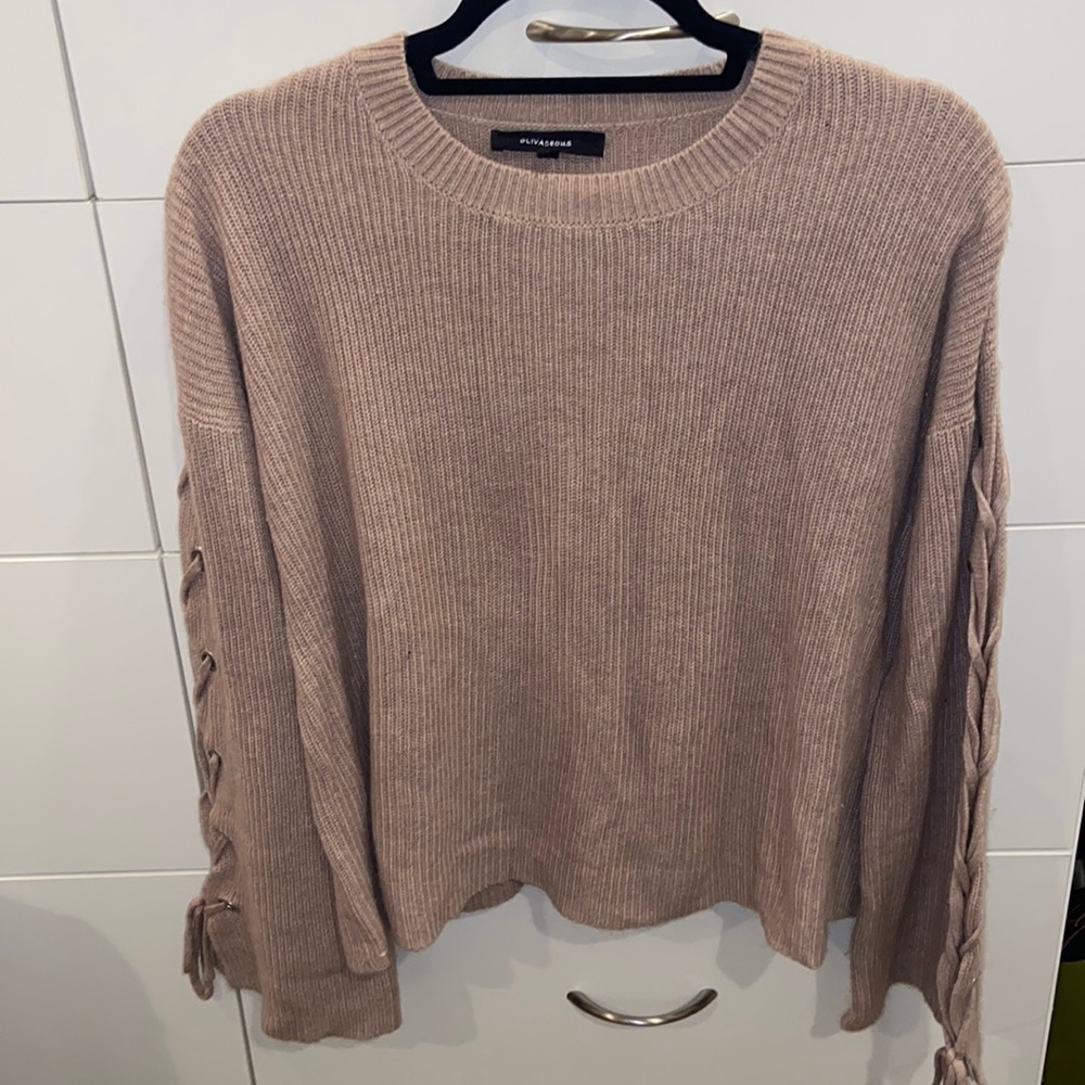 Sweater with lace up arms
